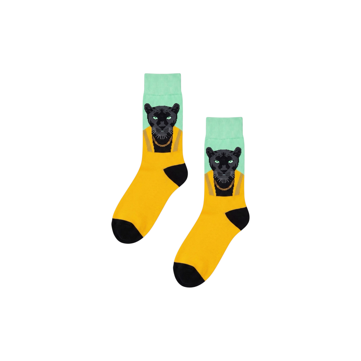 vibesocks Skandic Dapper hediye kutusundan çıkan siyah panter desenli, sarı ve mint yeşili renkli pamuklu çorap çifti