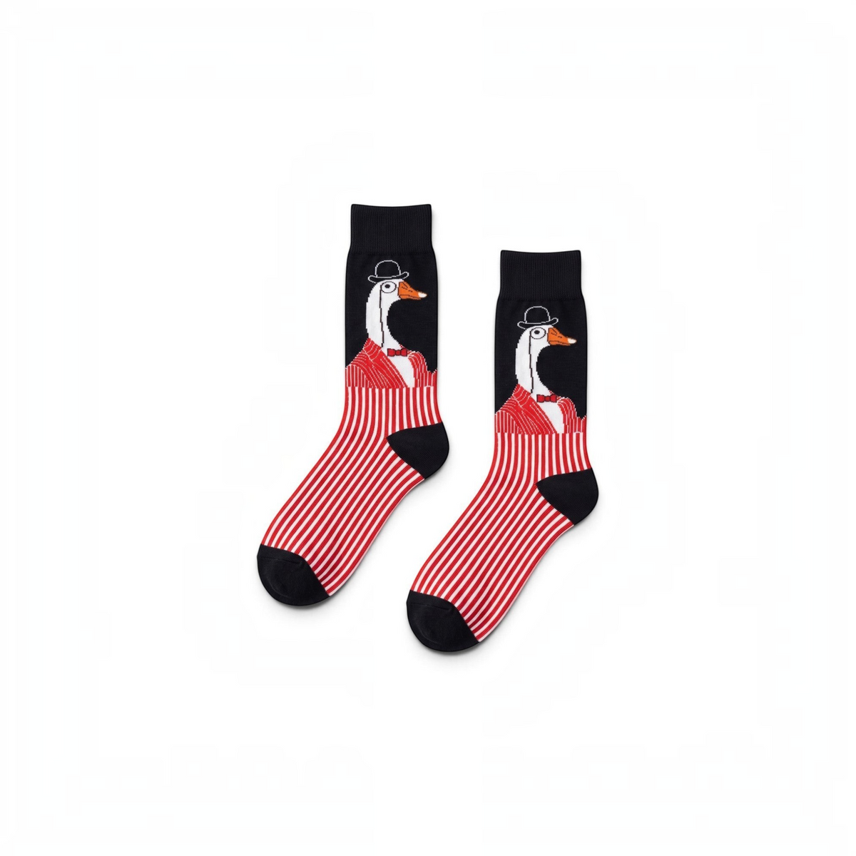 vibesocks Skandic Dapper hediye kutusundan çıkan, üzerinde şapkalı kaz figürü ve kırmızı çizgili desenli siyah çoraplar